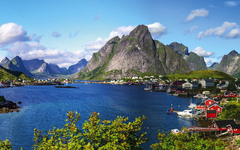Reine in Lofoten Islands, Norway, with traditional red rorbu hut
